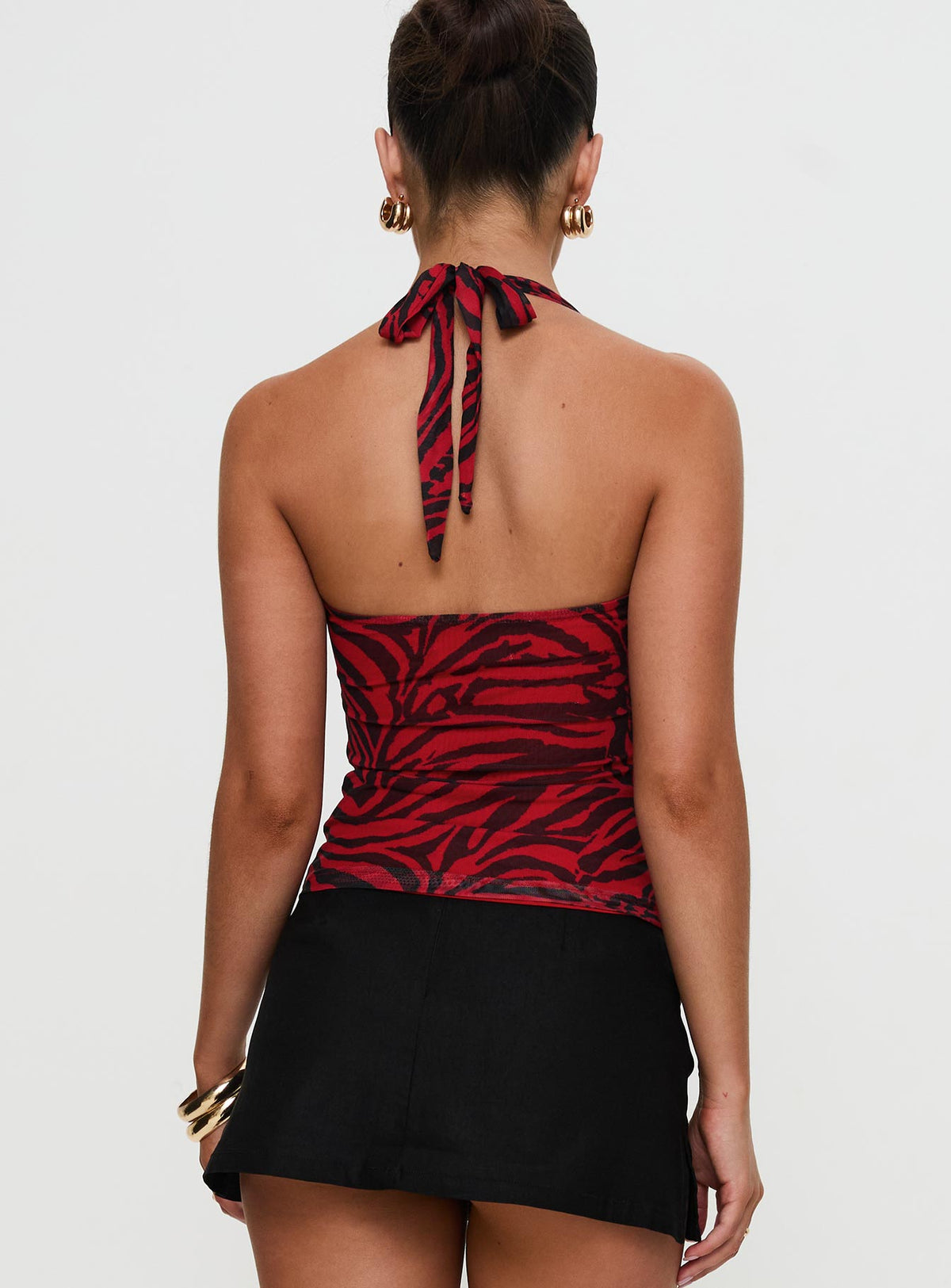 Red and black zebra print mesh halter top with buckle front